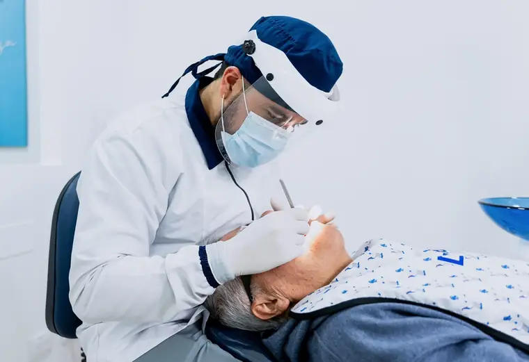 Dentist treating a patient