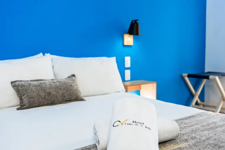 Hotel room with an embroidered towel